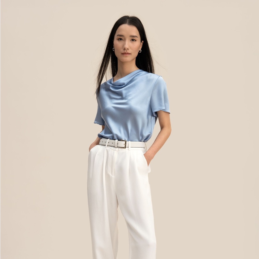 NWOT Light Blue Short Sleeve Silk Top
Puli top